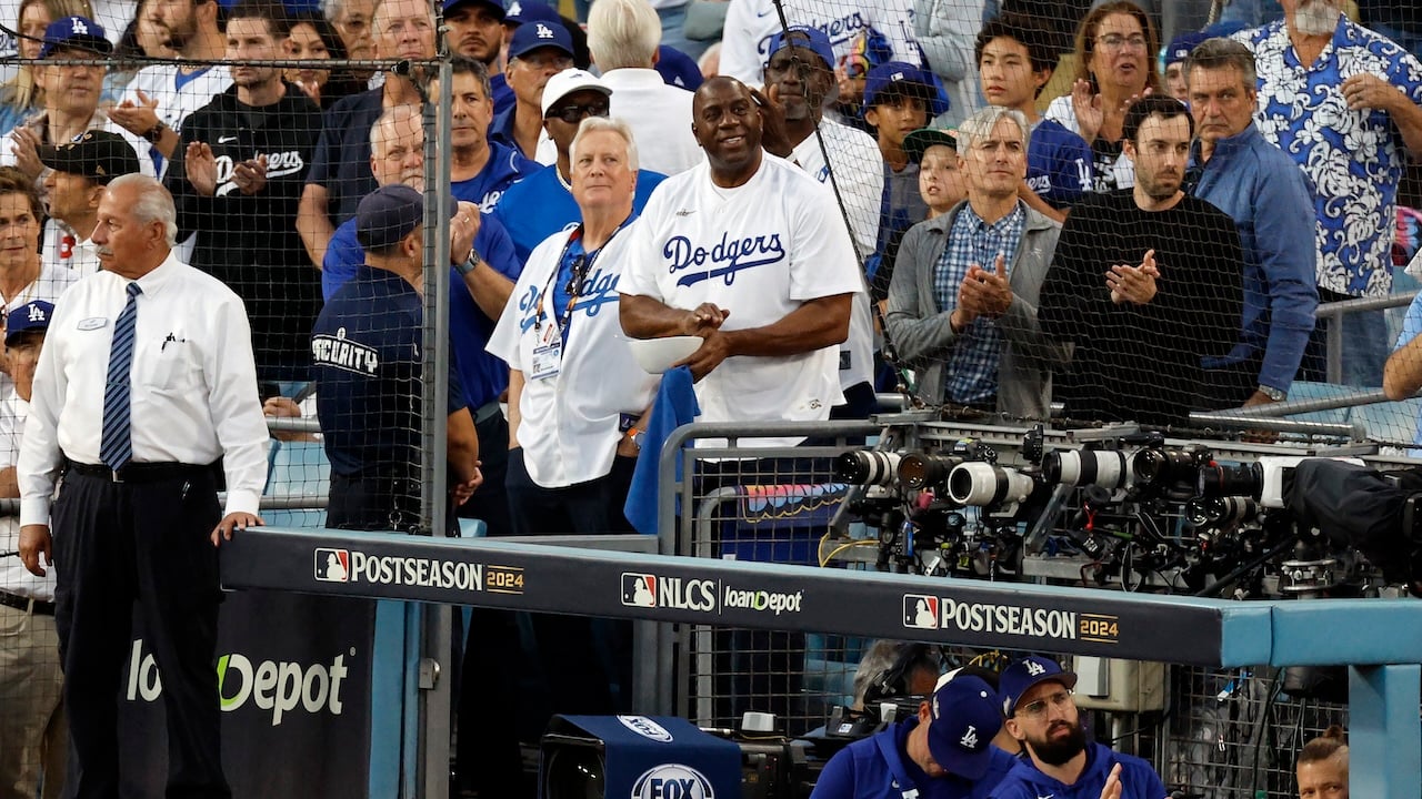 Magic Johnson’s business ties to Mark Walter face scrutiny amid ...