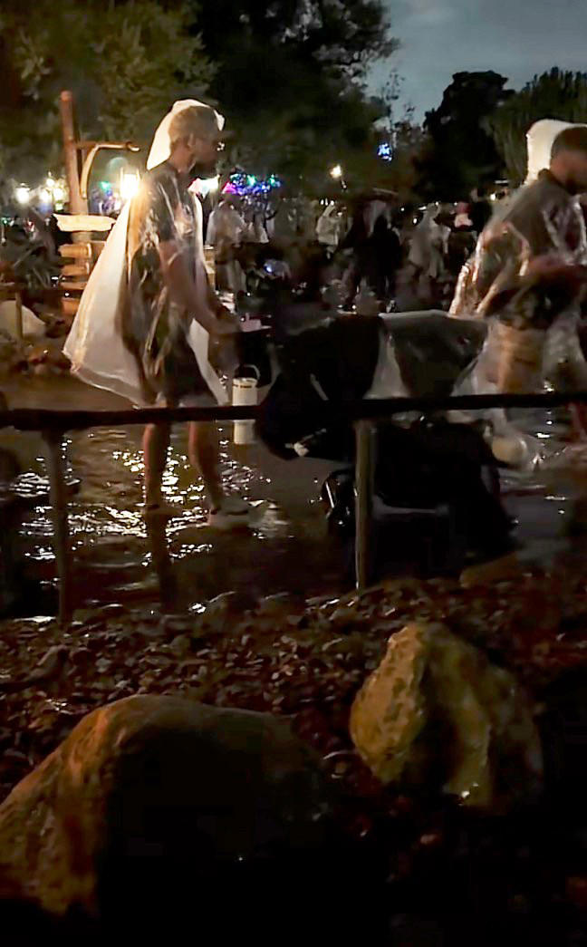 Freak floods hit Disneyland as guests left scrambling for higher ground ...