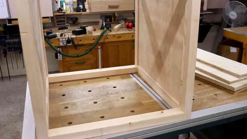 A woodworker begins a DIY project for the workshop