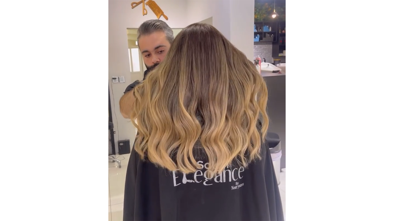 Creating buttery beige waves with brunette root blending resulting in ...