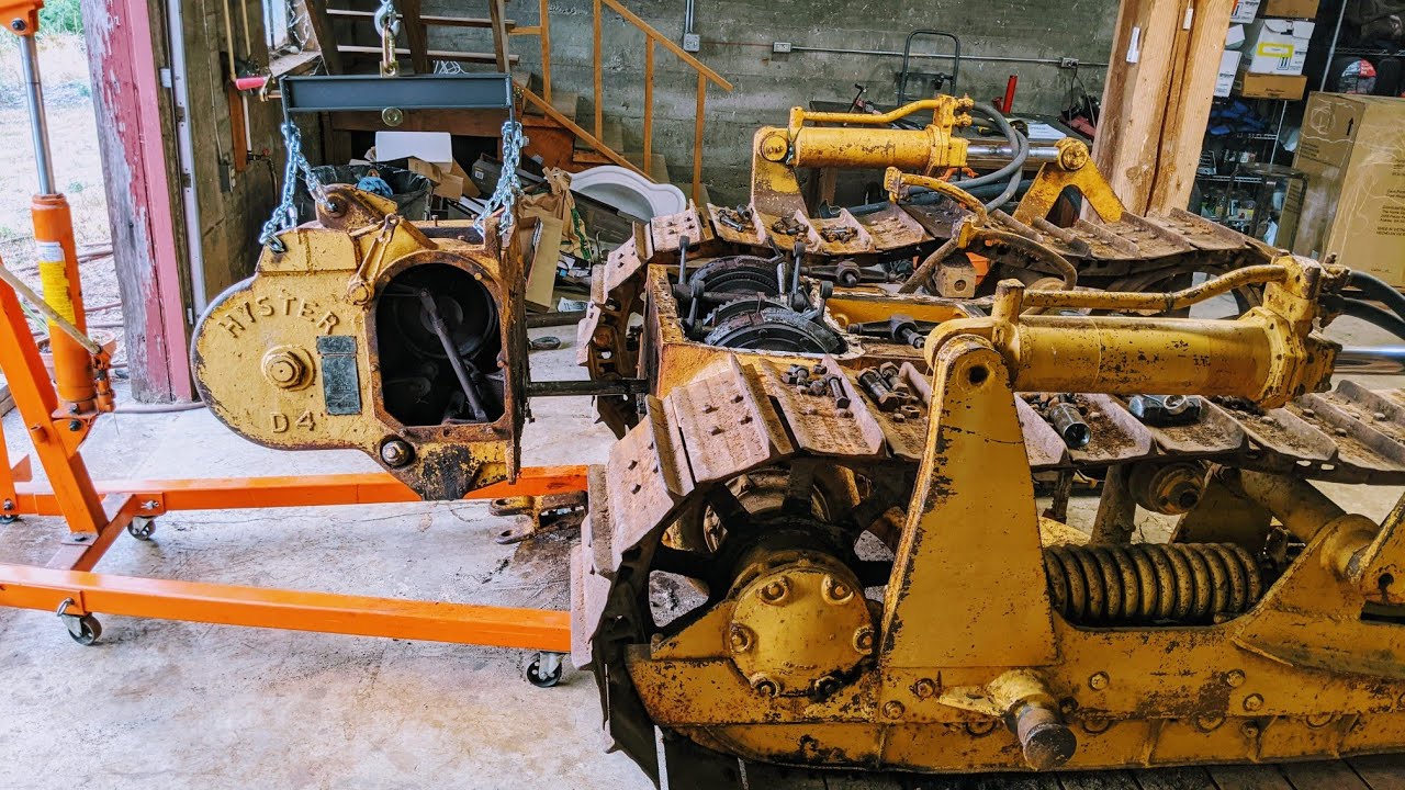 Removing the heavy winch from a Caterpillar D4 dozer