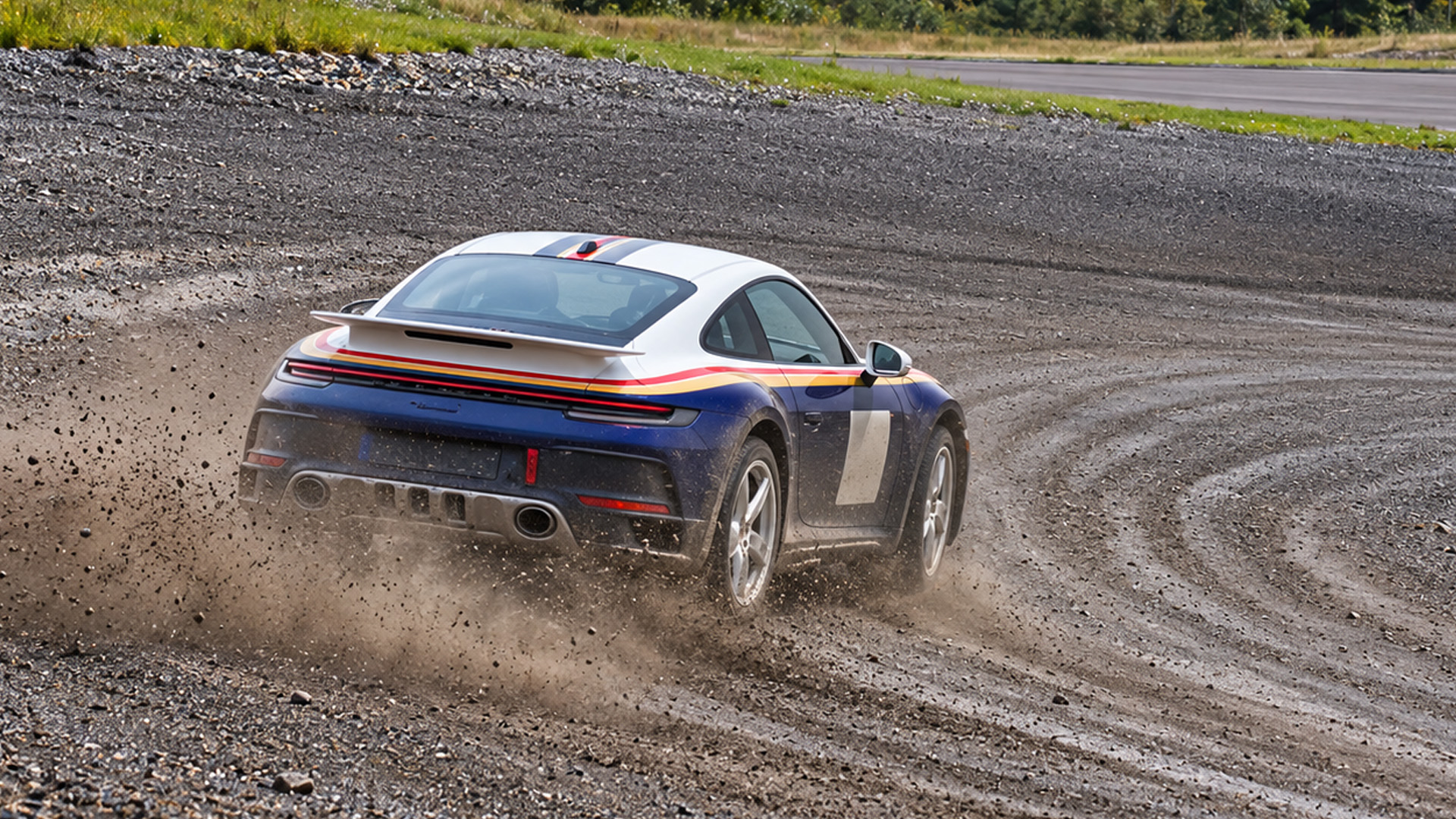 Porsche 911 Dakar demonstrates its off-road capabilities on a gravel track