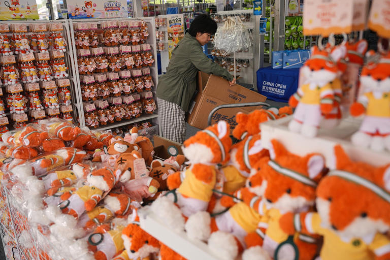 China's economy accelerated in the July-September quarter on robust exports