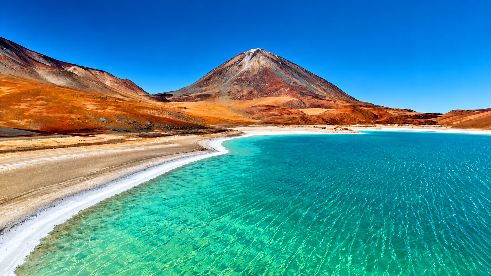 Como um lago pode existir entre estas montanhas vulcânicas?