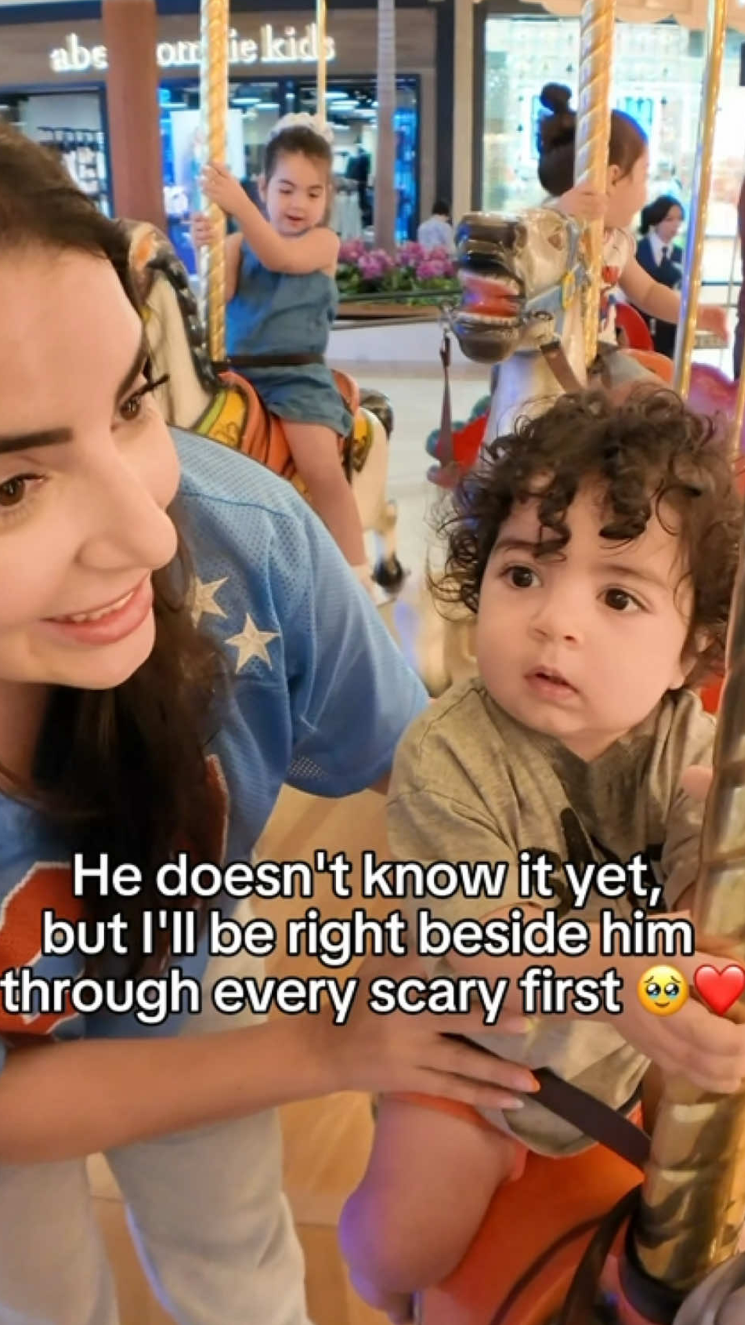 A baby’s first carousel ride and the joy of new milestones