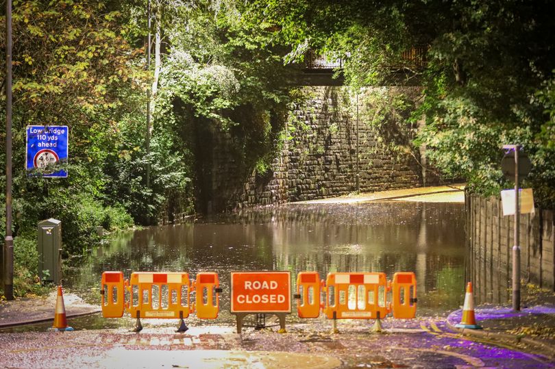 Roads flooded and train lines blocked as Greater Manchester hit by ...