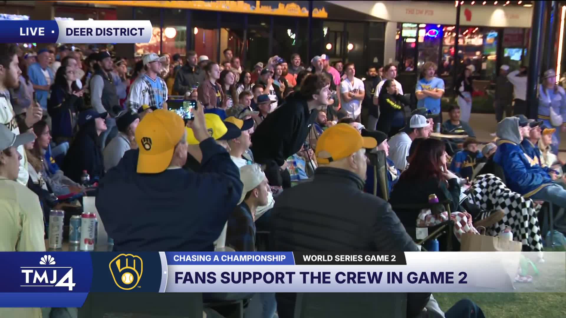 Brewers fans give it their all at Deer District watch party, cheering ...