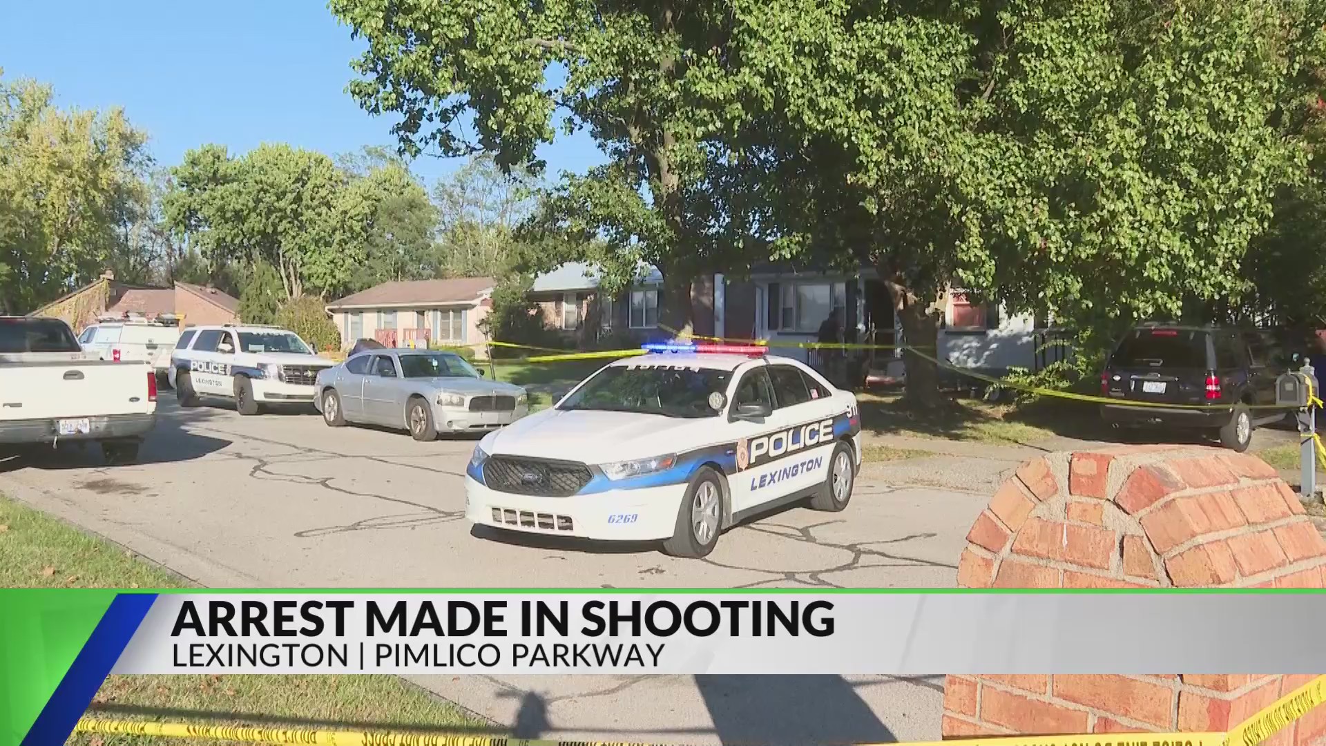 Woman shot in Lexington neighborhood, man in custody