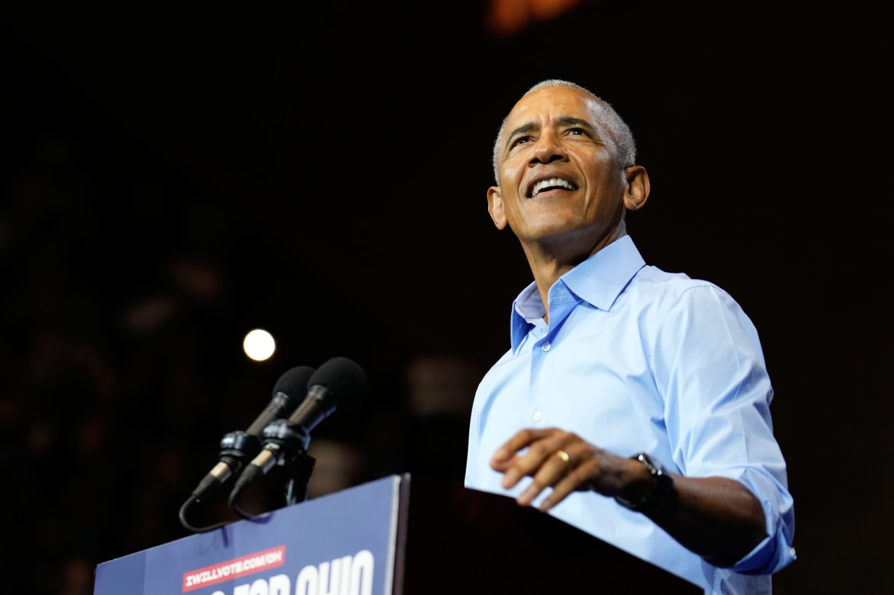 Obama storms onto campaign trail with harsh words for Trump