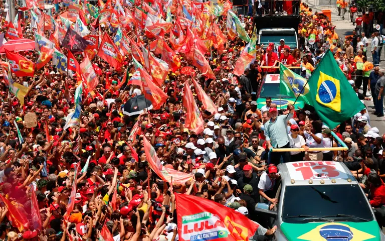 Thousands rally for Lula and Bolsonaro on eve of tight Brazil vote