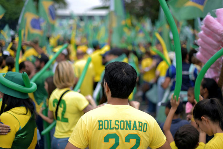 Thousands rally for Lula and Bolsonaro on eve of tight Brazil vote