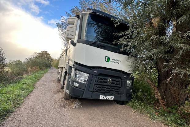 Somerset Council contractor's lorry sinks into peat during road repairs