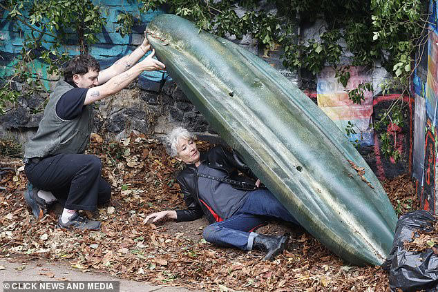 Emma Thompson goes under cover... hiding beneath canoe as she films new ...