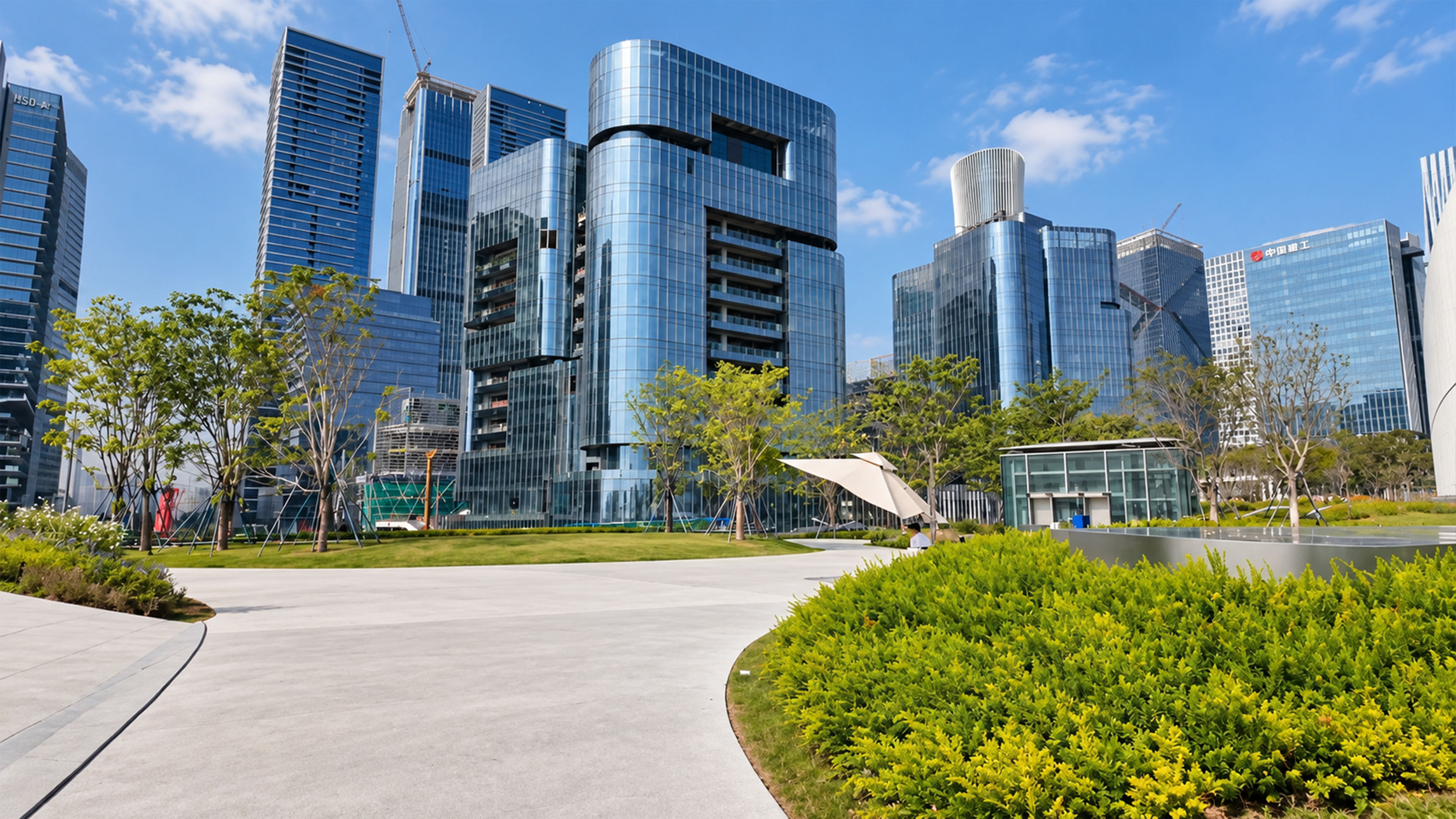 A futuristic glass building with giant open sections in Shenzhen