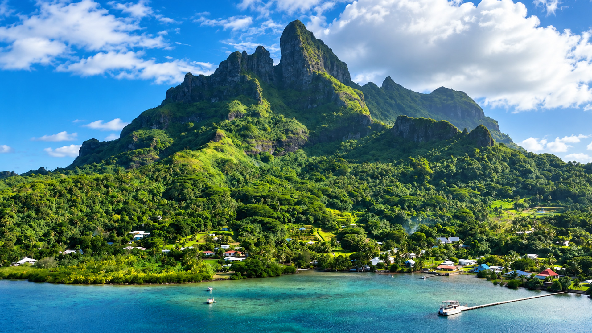 Can you see the village beneath these giant peaks?