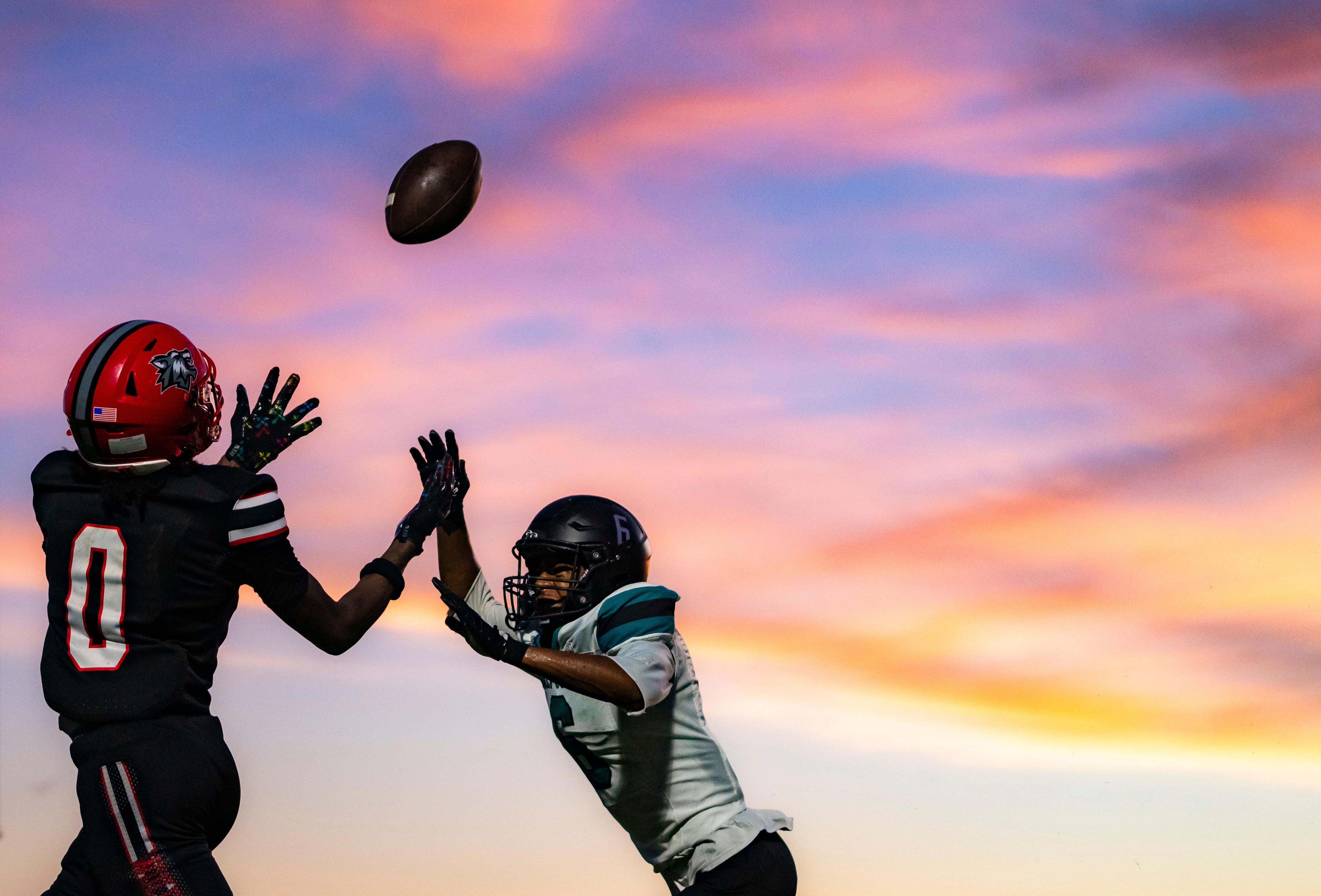 Photographer uses sunsets, beautiful color to enhance sports images