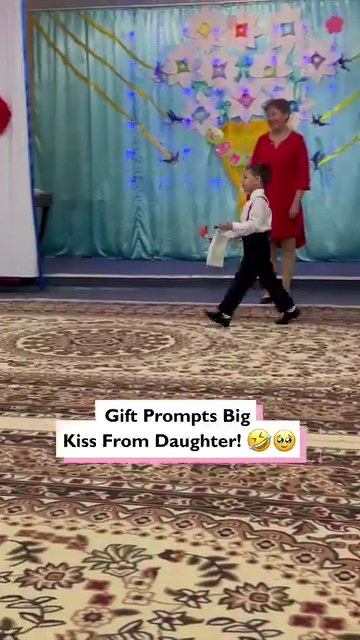 Gift prompts big kiss from daughter