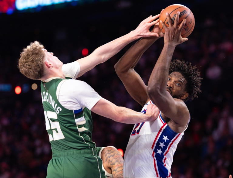 Joel Embiid posts triple-double, 76ers handle Bucks