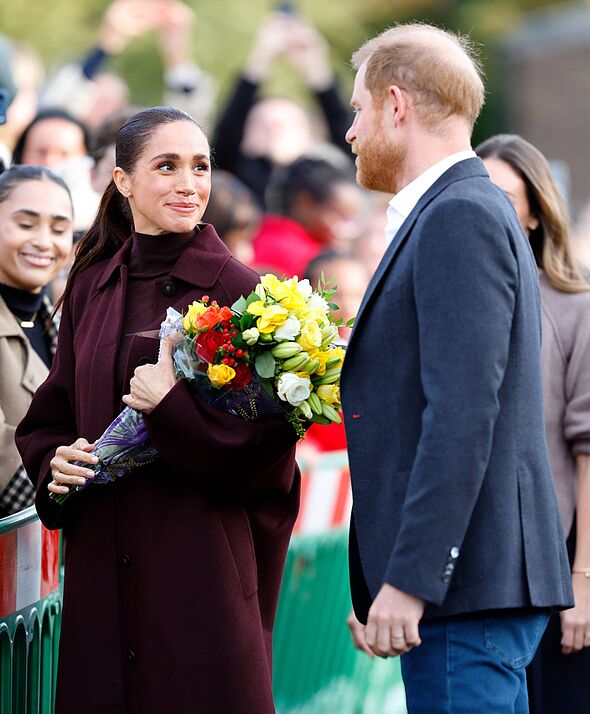 Prince Harry and Meghan Markle left surprised by crowd's reaction as ...