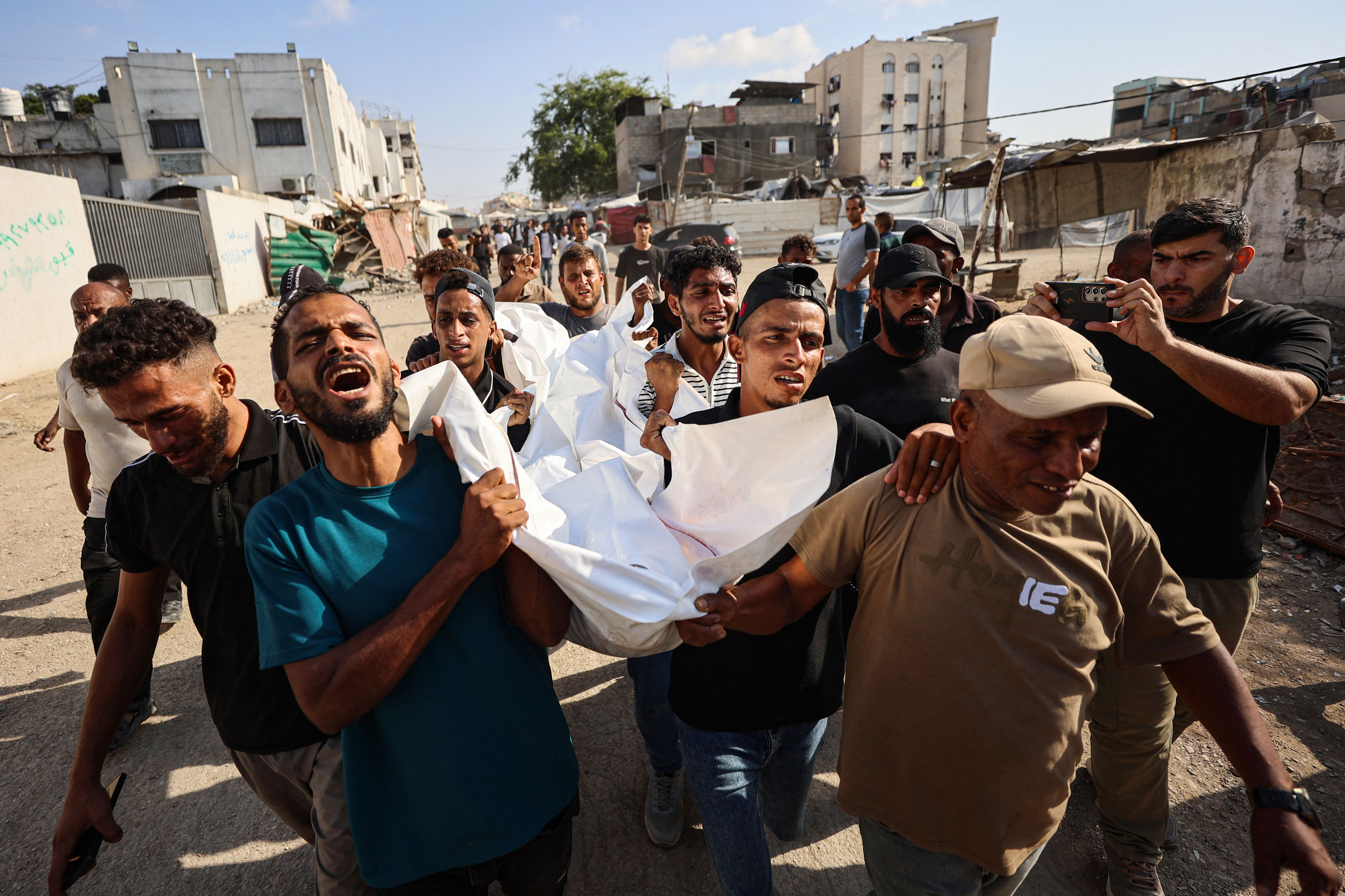 Seven killed in Gaza as Israel targets university campus and other sites