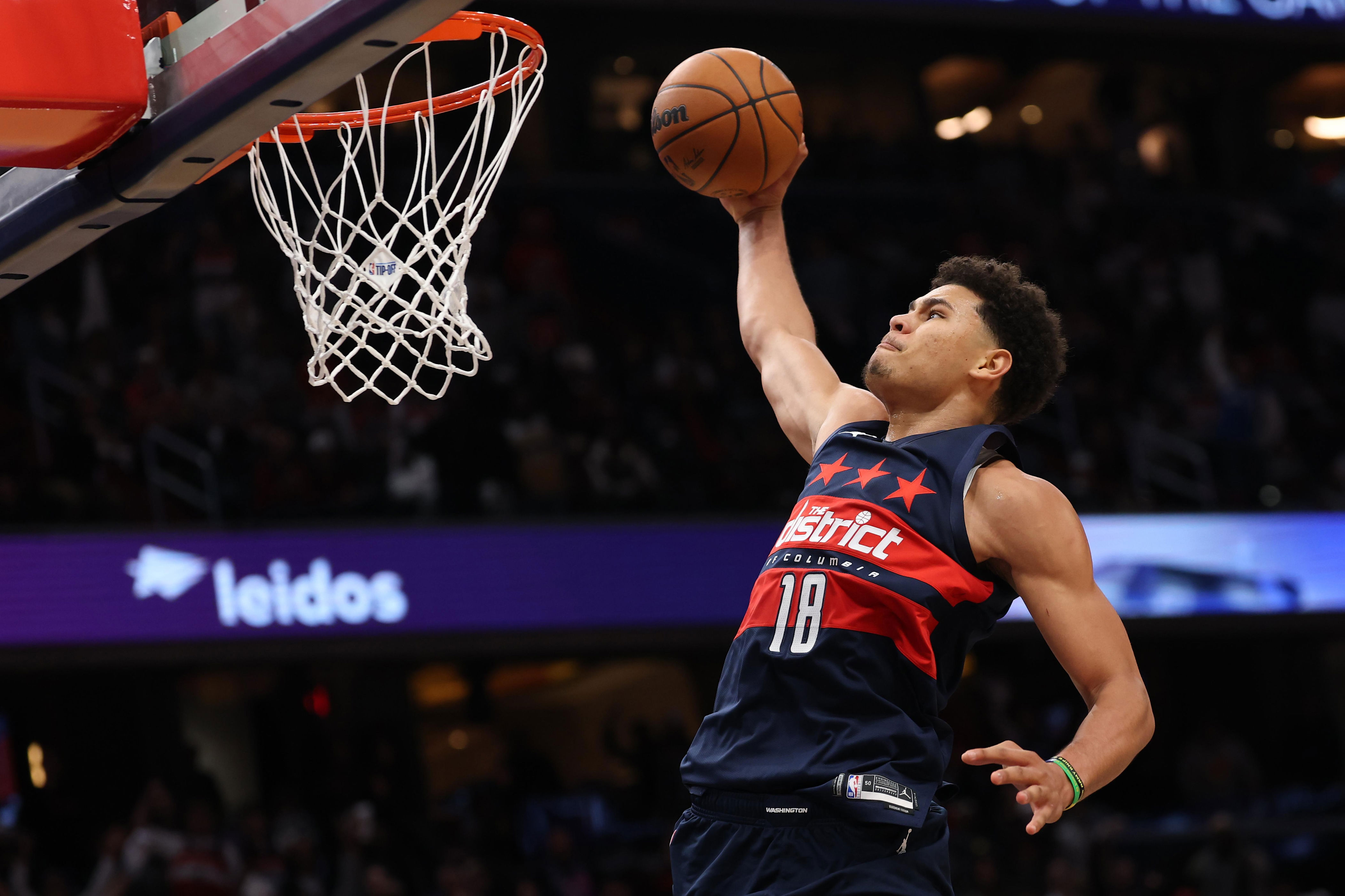 Wizards stave off Bulls comeback for second win