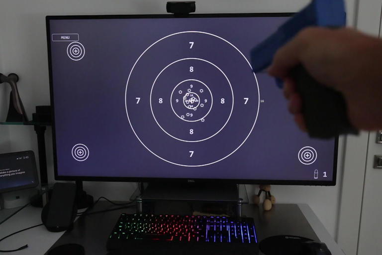 Someone turned their monitor into a laser pointer firing range game ...
