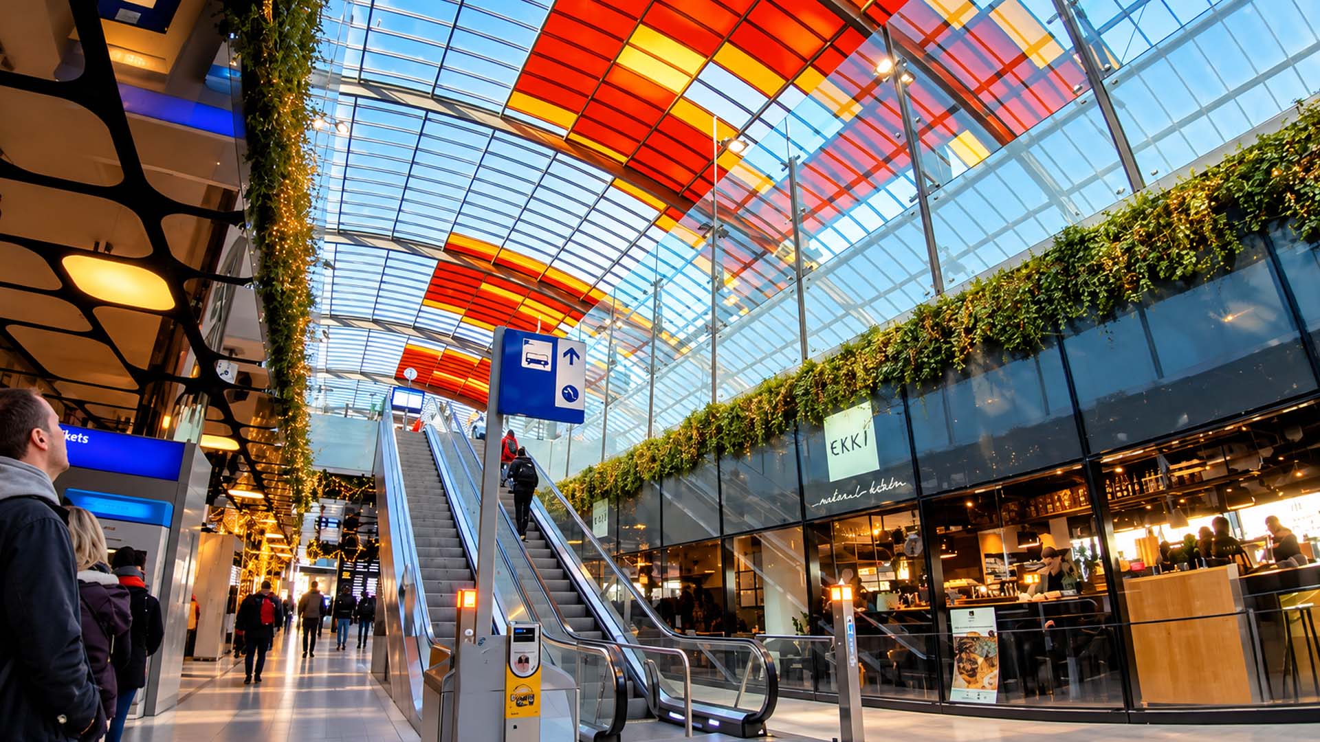 Inside Amsterdam’s railway station with a colorful glass roof (4K)
