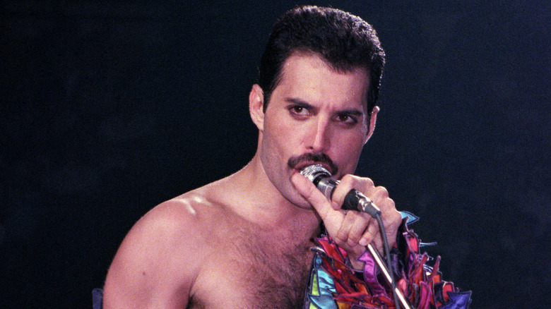 Quote of the day by Freddie Mercury: 'By nature, I'm very restless and ...