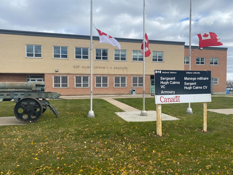Emergency vehicles escort remains of Pte. Shaun Farrell to Prince Albert