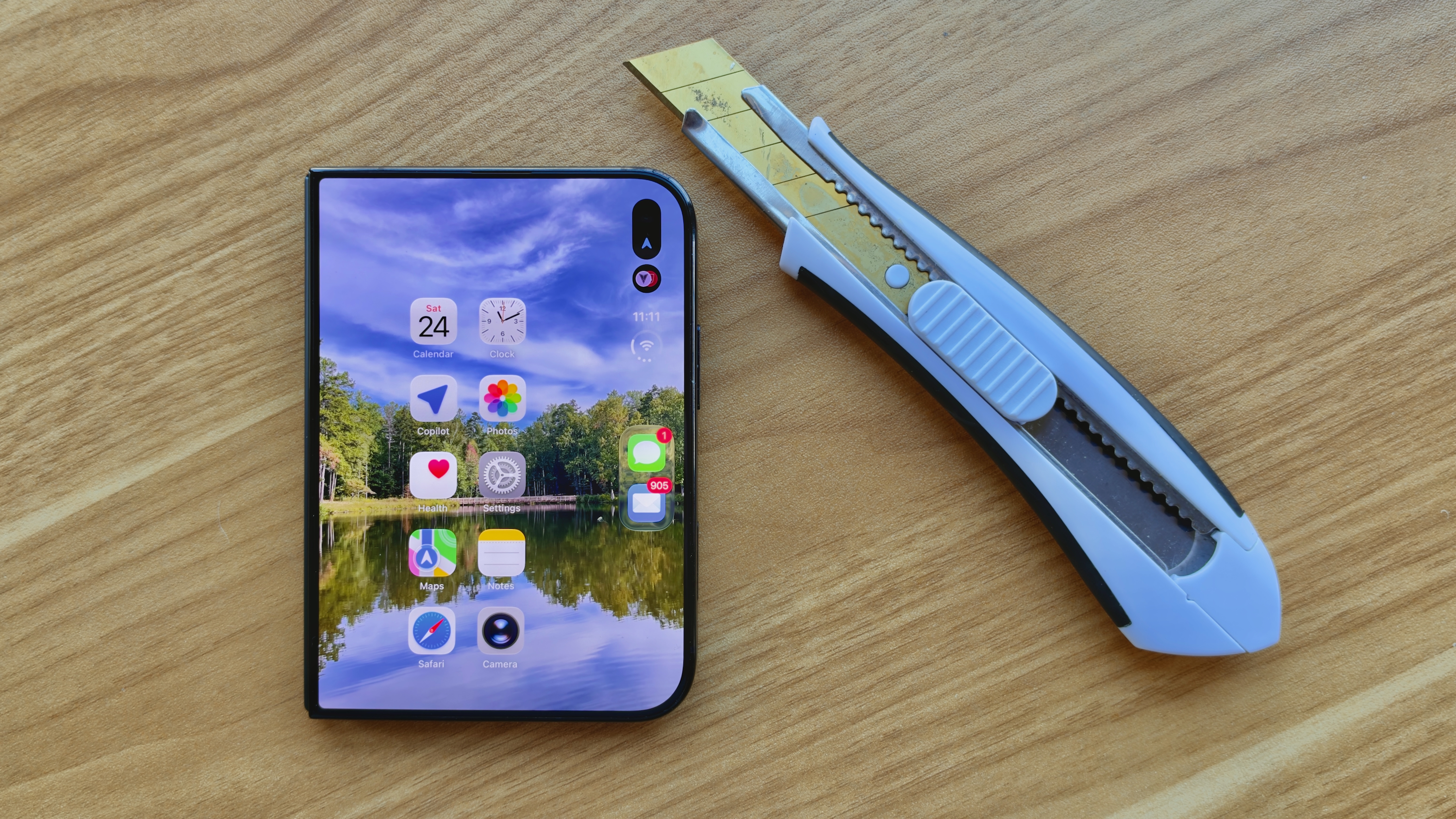 Man destroys $2,000 iPhone duo with dirt, fire, knives and medieval ...