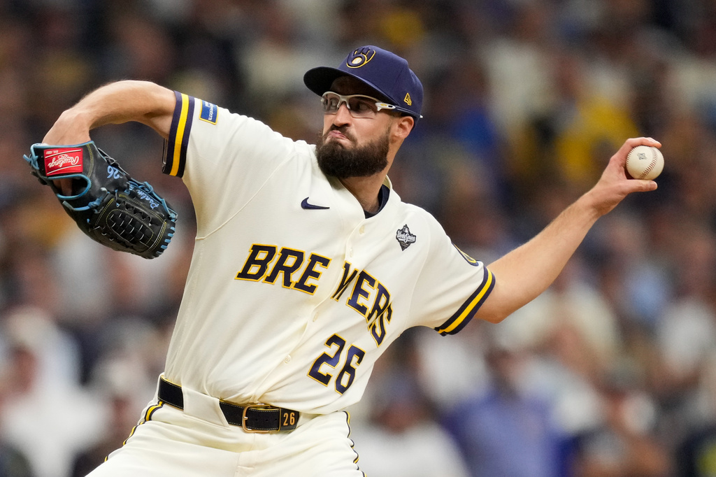 Brewers lefty Aaron Ashby nears postseason scoreless relief record with ...