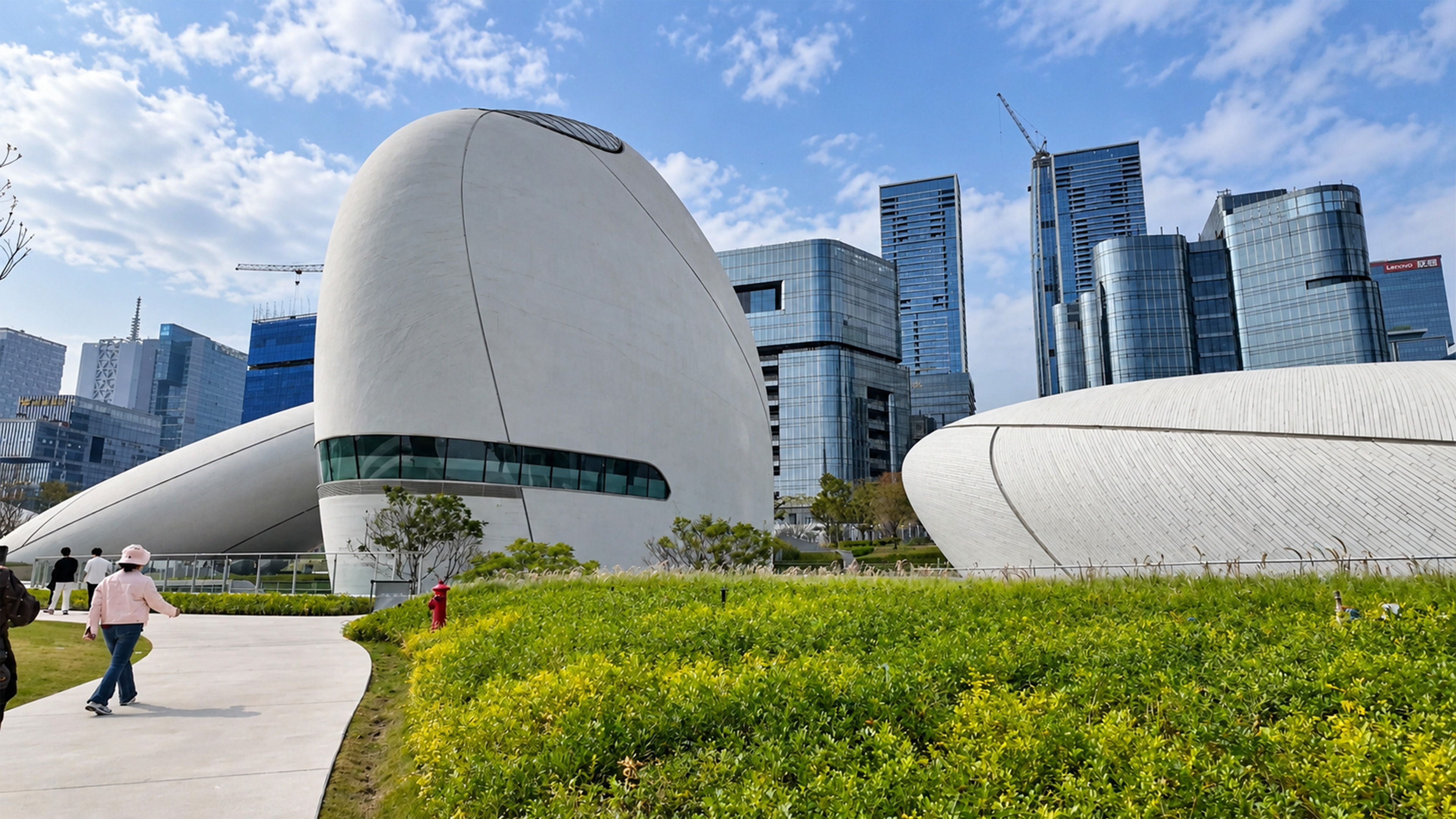 A giant egg shaped building stands among Shenzhen's glass towers