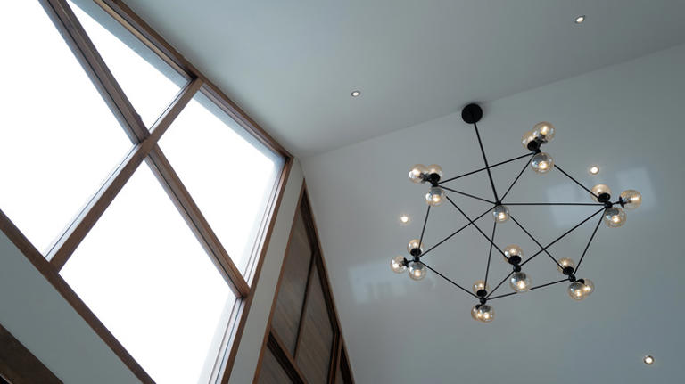 Avoid breaking this high ceilings rule when choosing lighting for a room