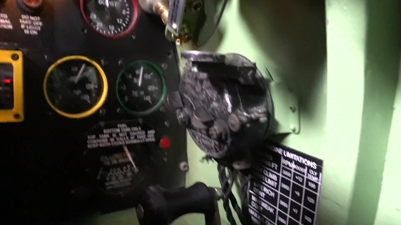 Mike Barnett tries a MkIX Spitfire replica simulator at home