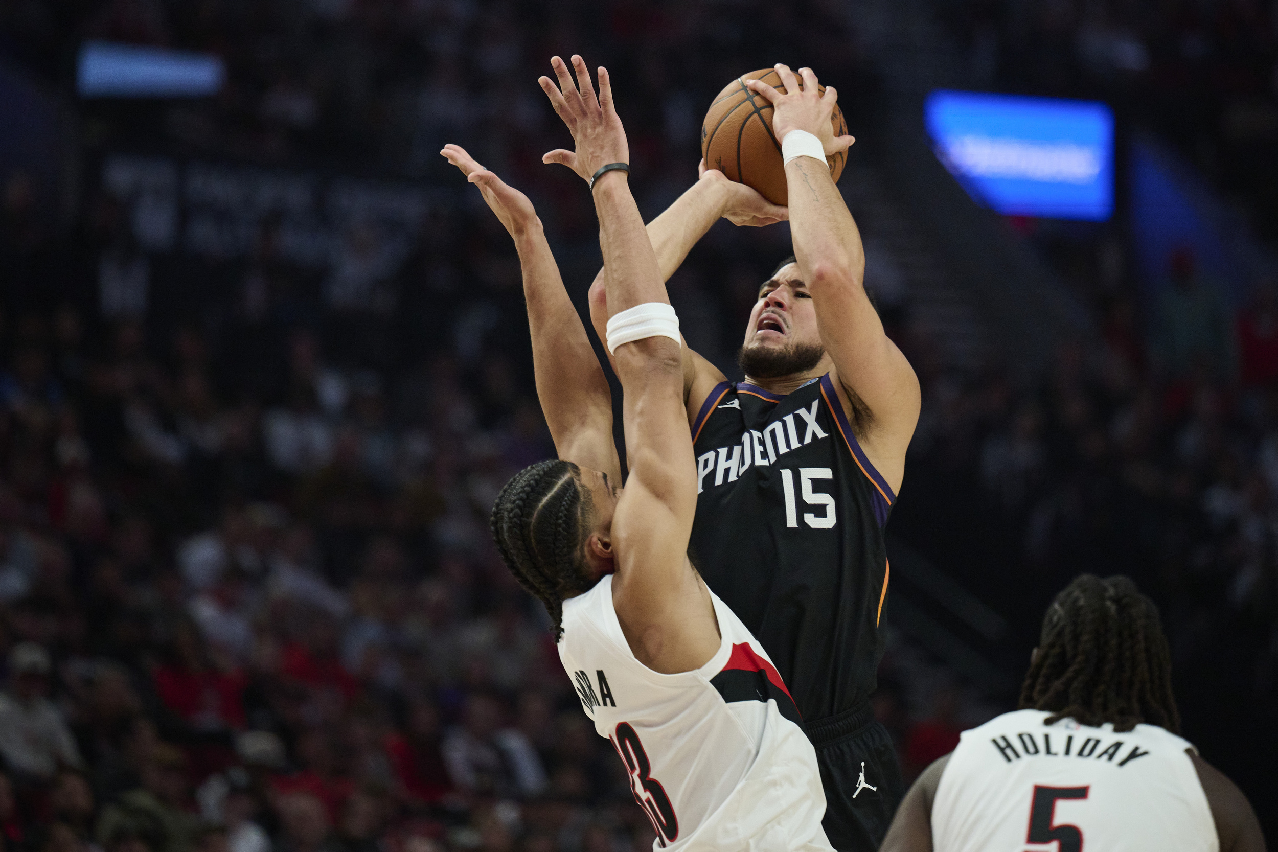 Devin Booker's historic home opener has Phoenix Suns fans buzzing
