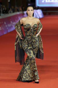 Kris Jenner wears Elizabeth Taylor's Scorpio cape in Rome