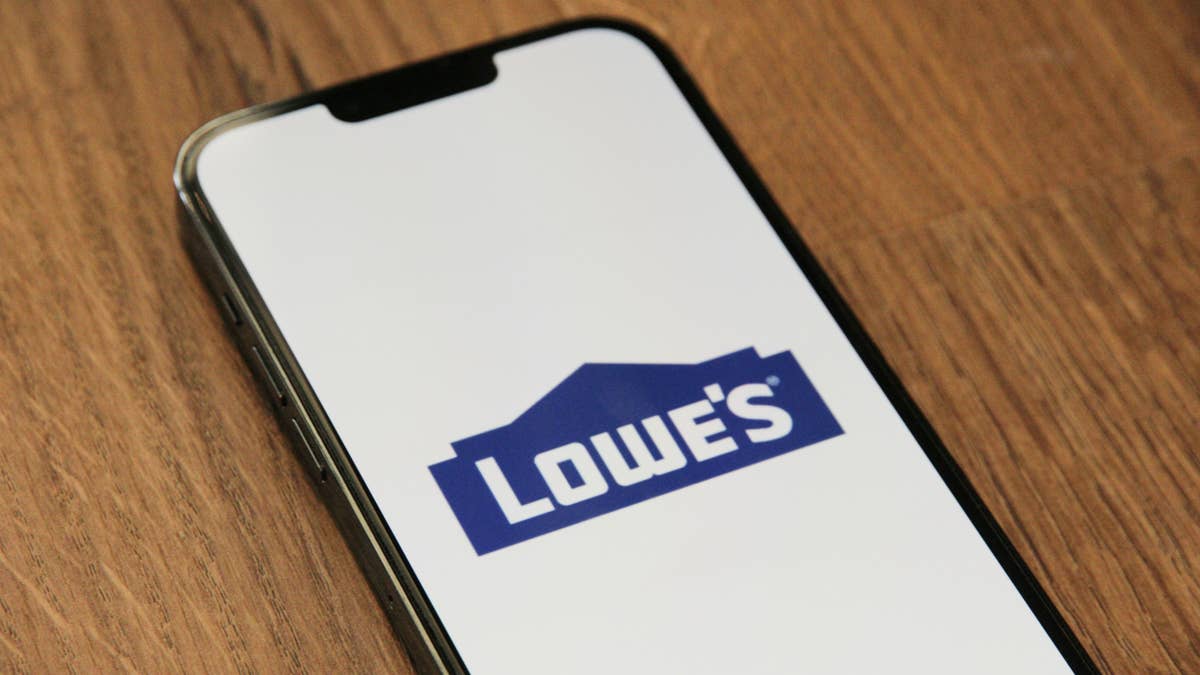 Lowe's rustic log cabin bird feeder holds an impressive 8 pounds of seed
