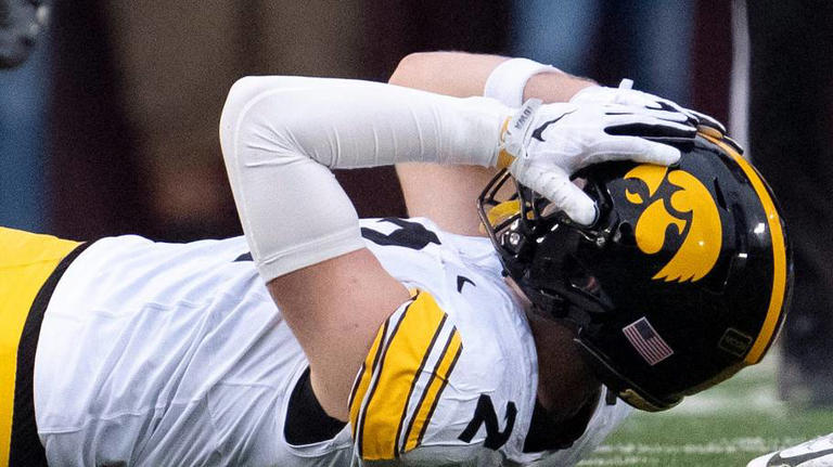 How far did Iowa football fall in the AP Top 25, Coaches Poll after ...