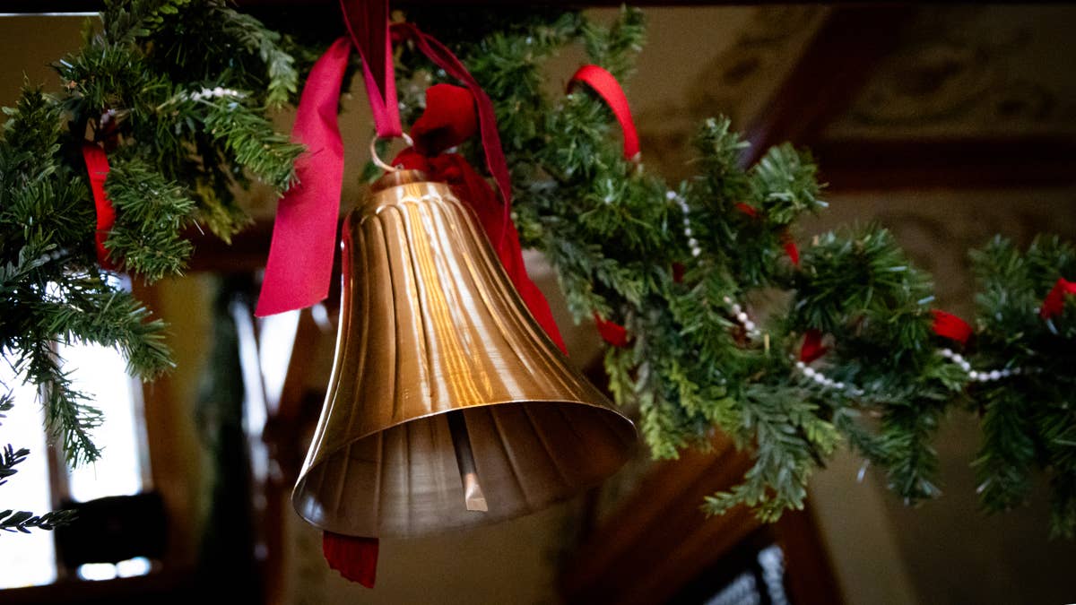Create a classy Dollar Tree brass bell garland for your holiday decor
