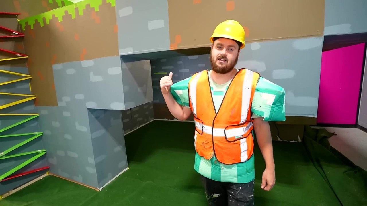 Matthew Beem tests his hamster in a real-life Minecraft maze