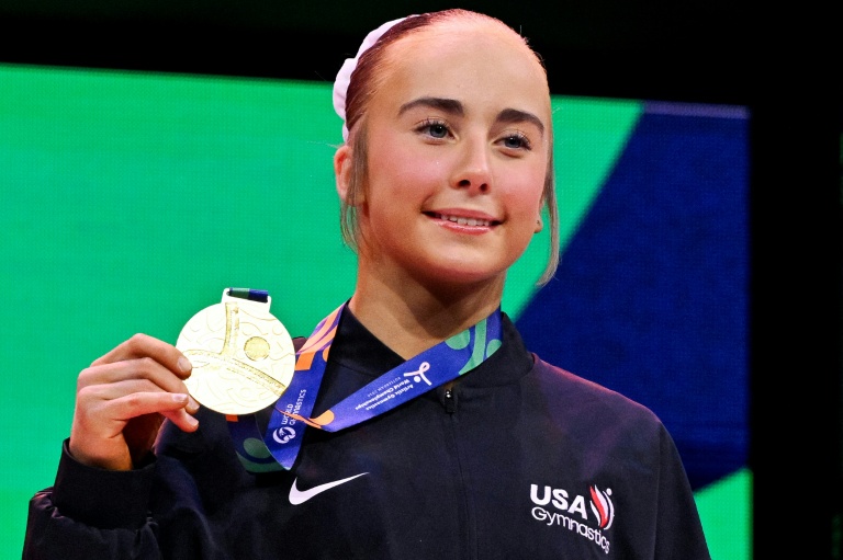 Pease spins to floor gold as US tops gymnastics medal table
