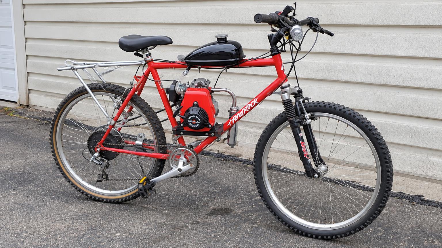 $190 four-stroke bicycle engine kit reaches 38 mph on a slight downhill ...