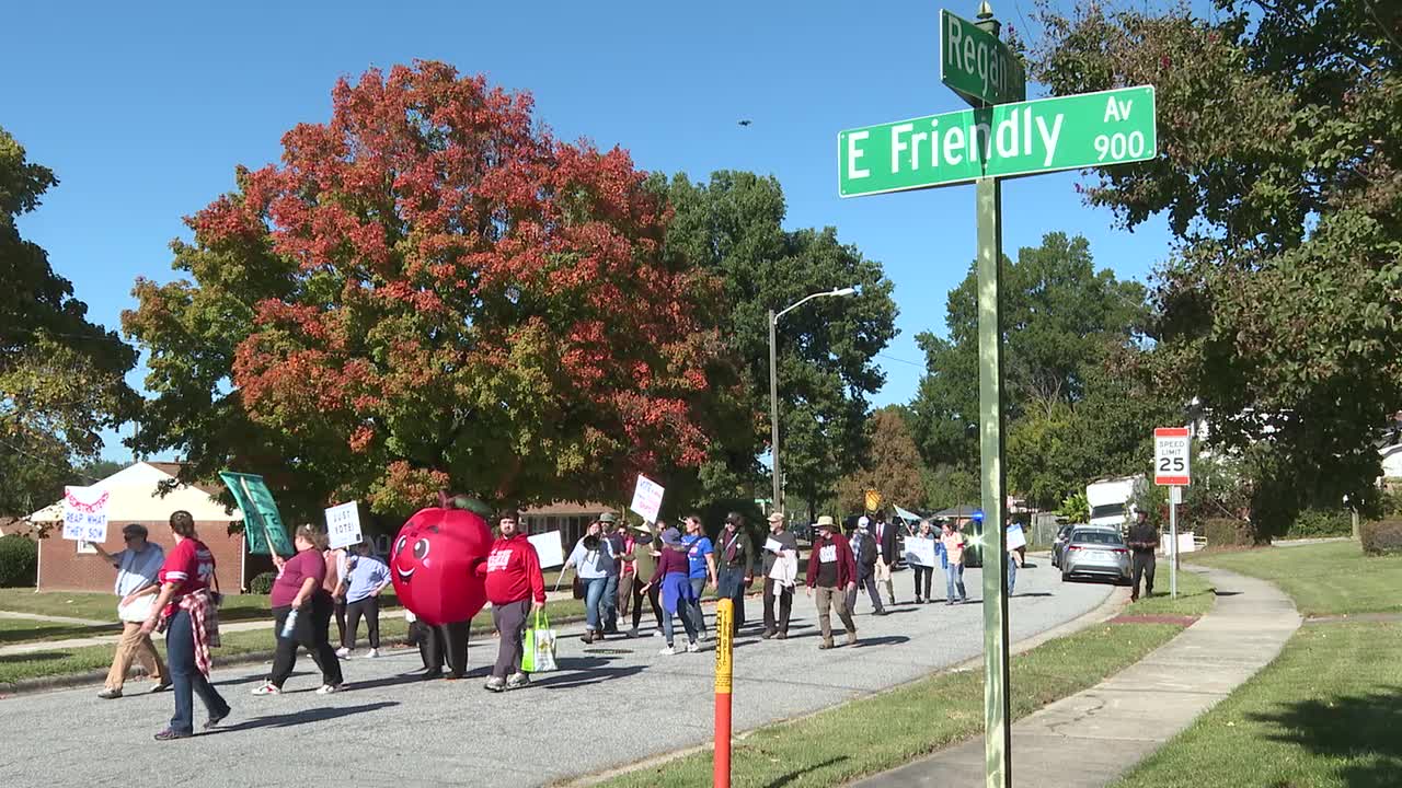 Greensboro citizens walk to the voting polls