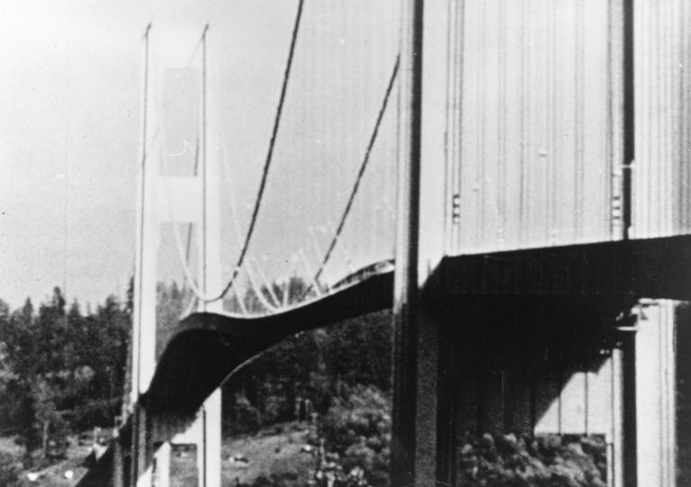 In 1940, the Tacoma Narrows Bridge opened at a cost of $6.4 million; it ...