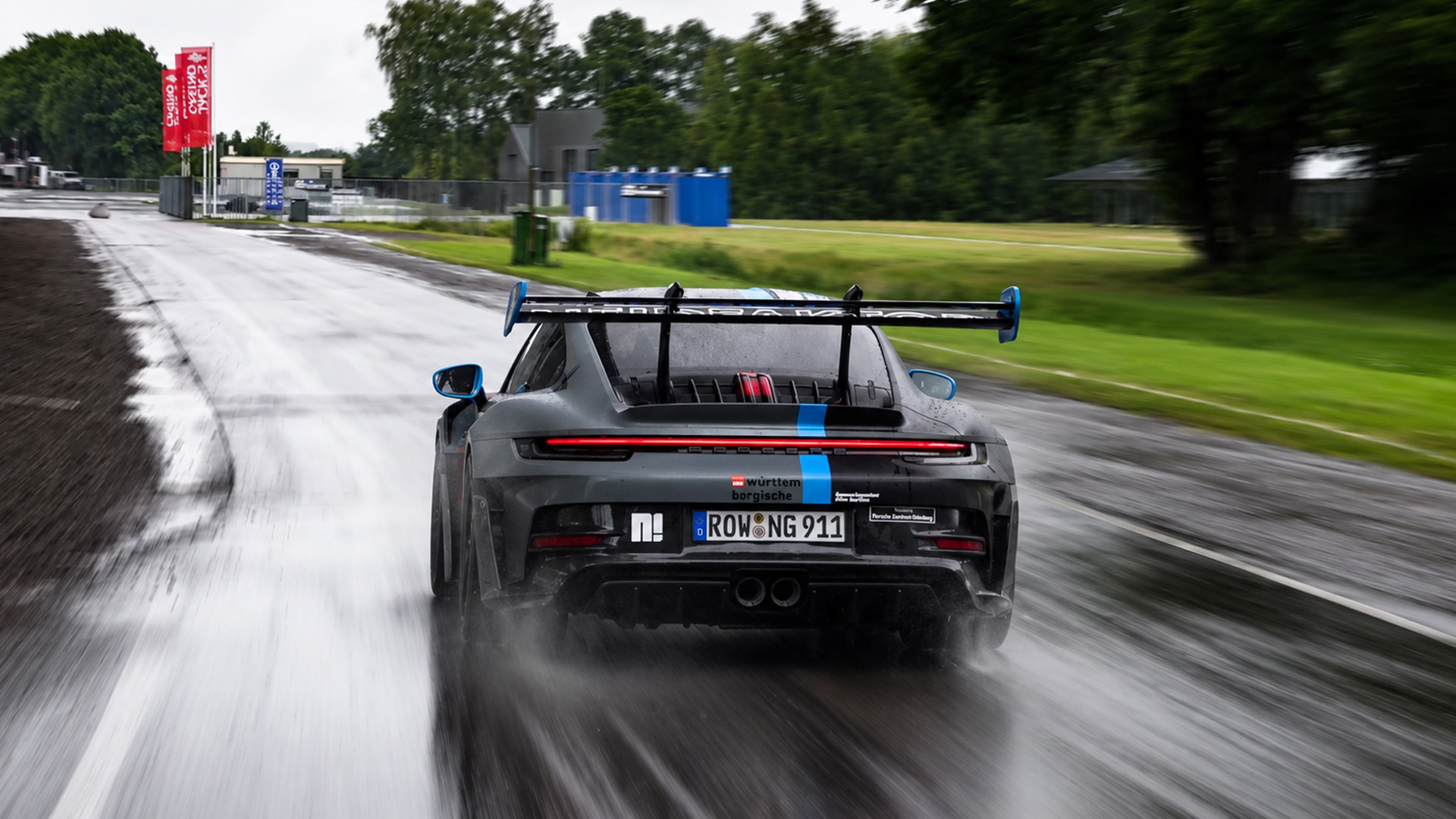 The road is wet and the Porsche GT3 RS is ready to accelerate