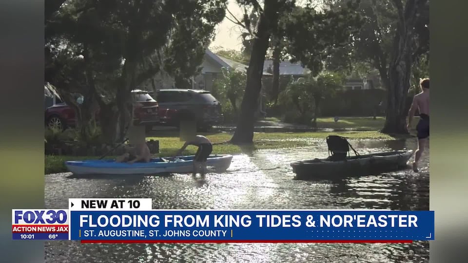 St. Augustine neighbors kayak down flooded street after king tide