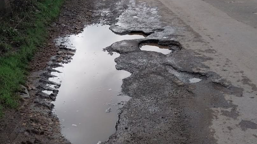 Photos show potholes days before fatal crash