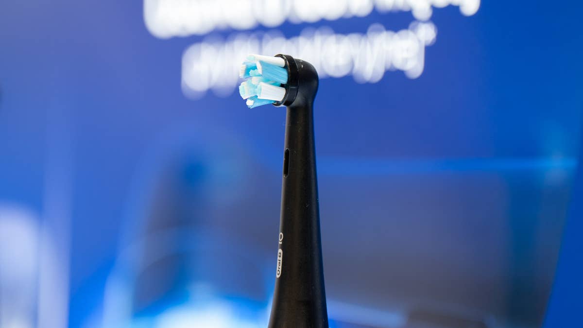 Seeing your back teeth on a tiny screen changes how you brush