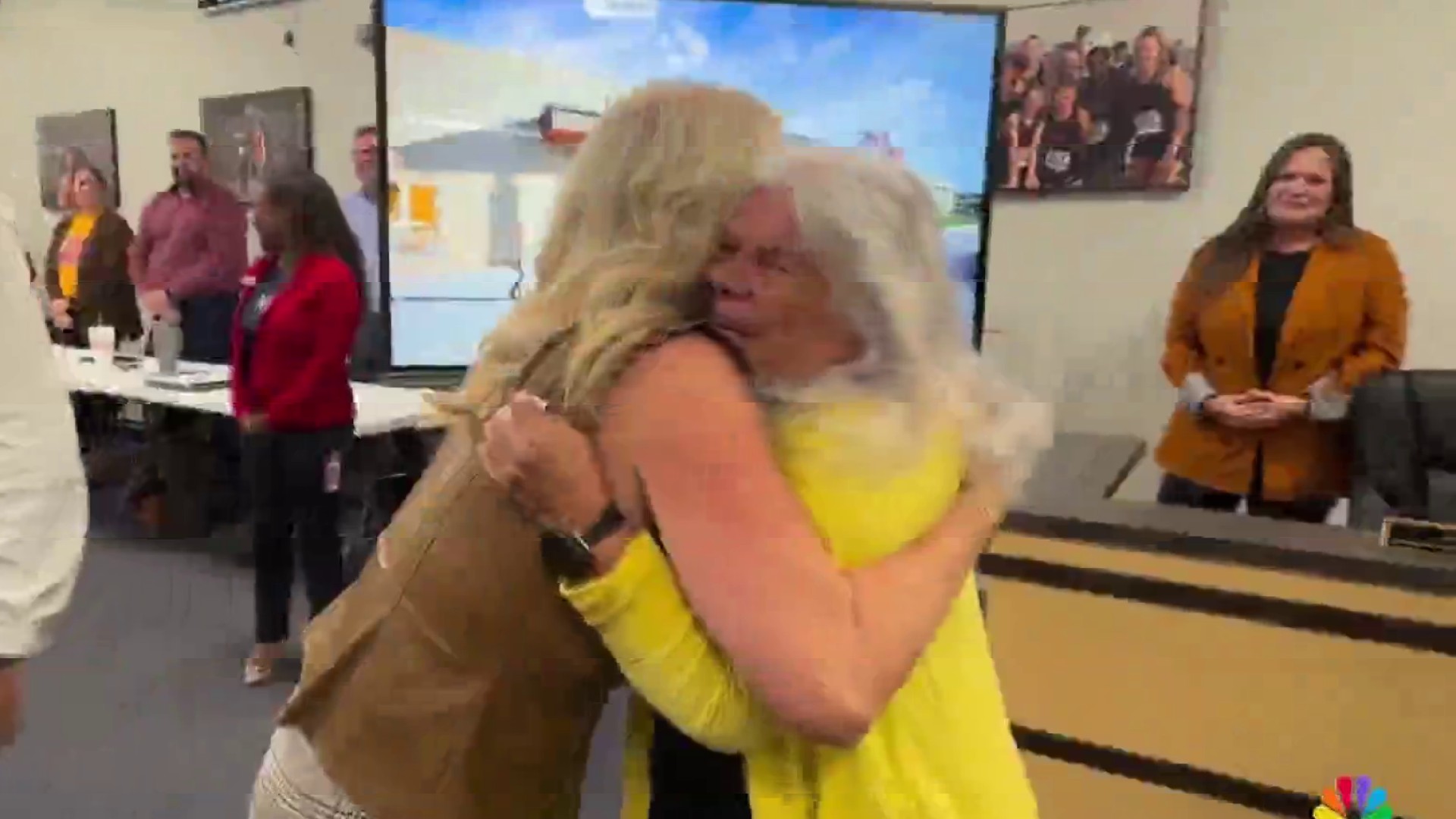 Good news: Retired custodian surprised with new school named in her honor
