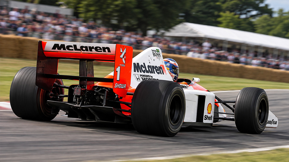 Legendary 90s F1 cars scream up the Goodwood hillclimb